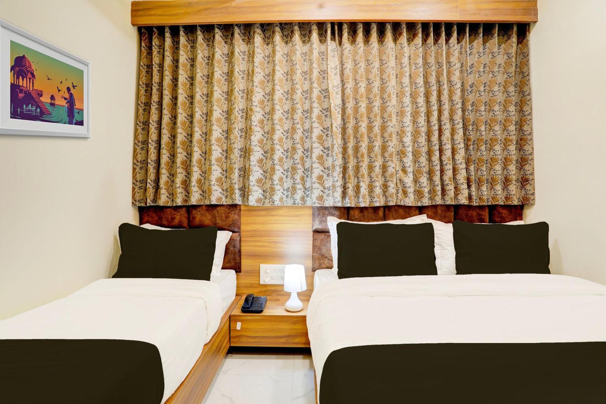 Hotel O Sun Light 阿穆达巴 外观 照片
