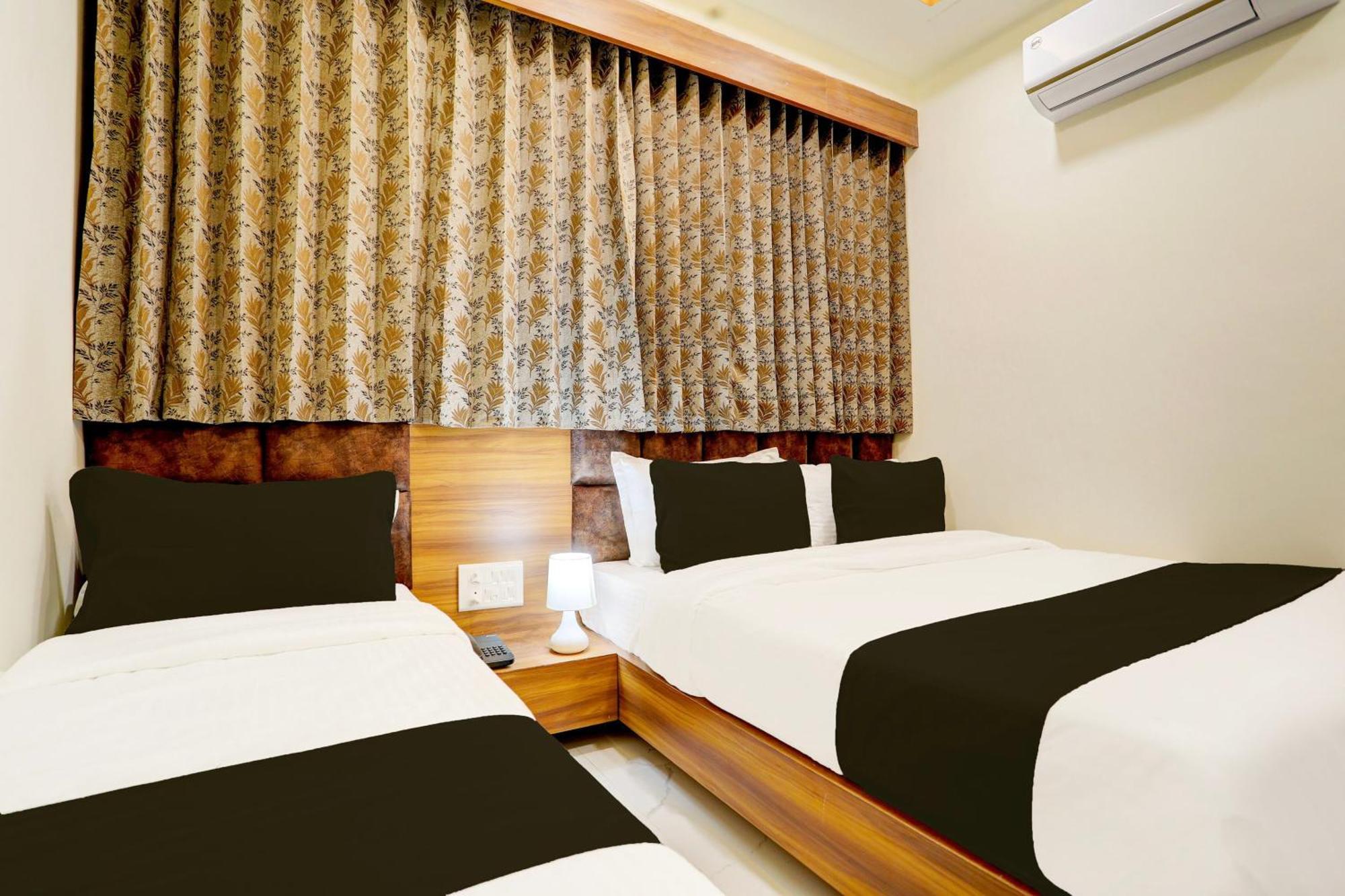 Hotel O Sun Light 阿穆达巴 外观 照片